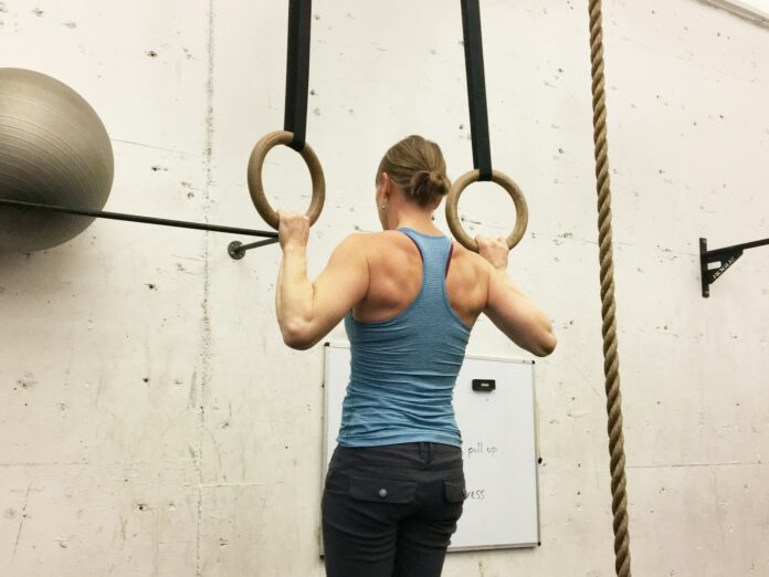 Photo by GMB Fitness woman on rope