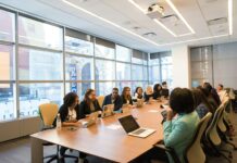 정부, 지역완결적 필수의료 확립 위해 과감히 재정 투자 group of people sitting beside rectangular wooden table with laptops