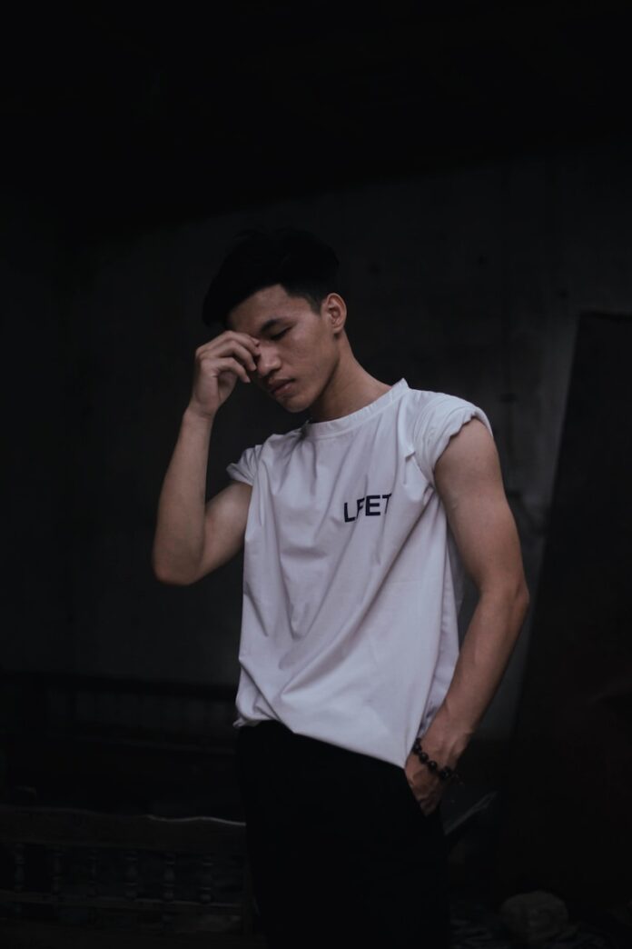man in white adidas crew neck t-shirt